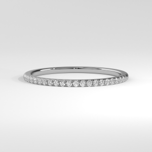 Thin diamond micro-pavé half-eternity band with round stones along a polished band