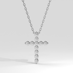 Diamond cross pendant necklace with round stones, suspended from a delicate chain